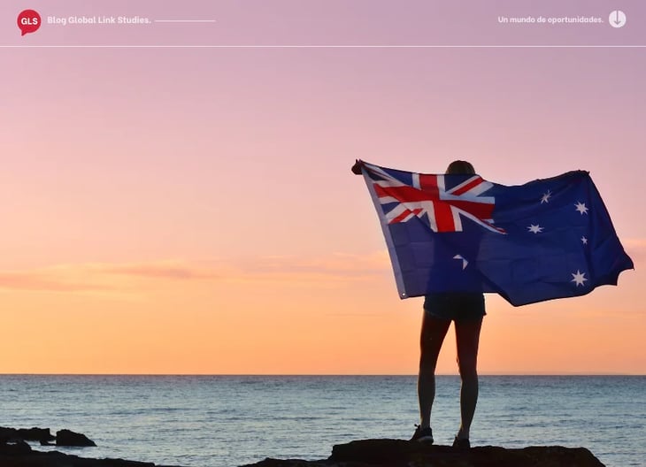 En la playa con bandera australiana