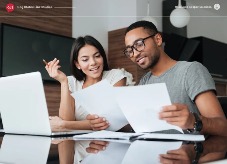 Mixed couple studying papers